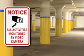Garage with Security Cameras Sign