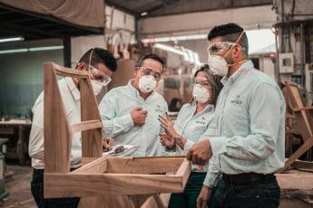 new york warehouse employees wearing face masks during covid-19